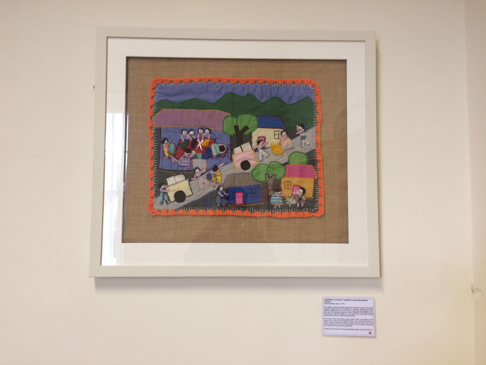 'Arpilleristas y cartoneros / Arpillerista women and cardboard collectors', from Conflict Textiles collection, on display at the Embassy of Chile, Dublin, Ireland. (Photo: Renato Gomez, Chilean Consul in Ireland)