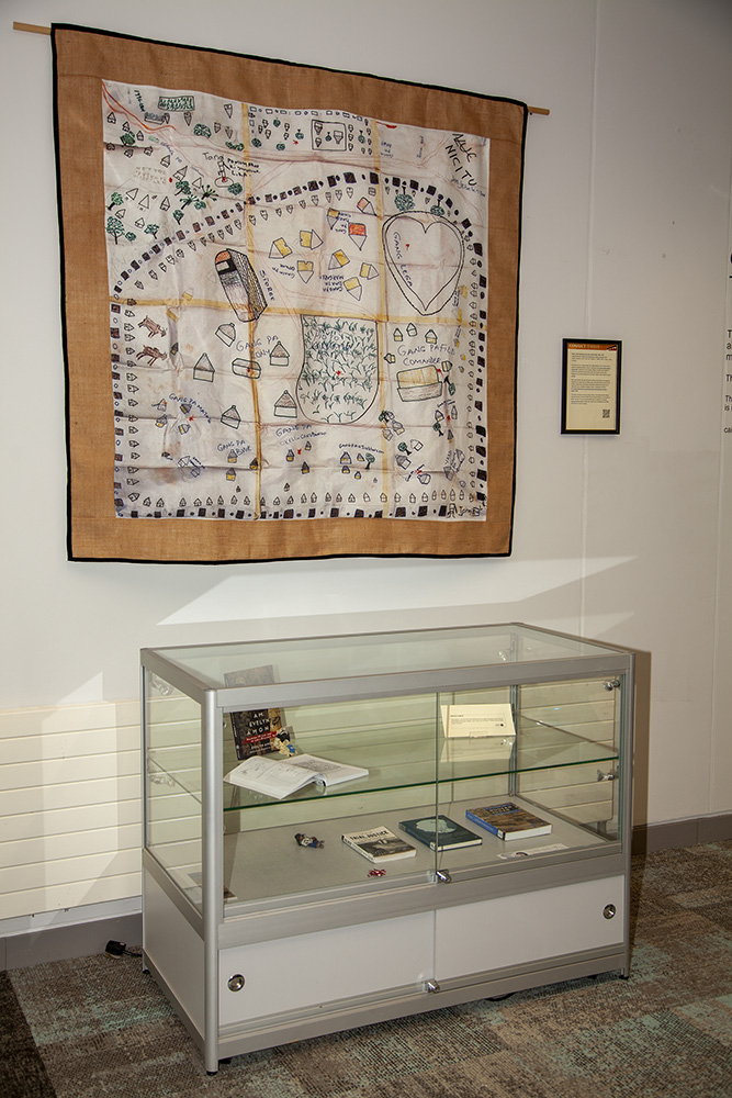 'Nicitu, Lord's Resistance Army base, South Sudan, 1996 - 2001', exhibited with reference material, at the Library, Derry~Londonderry campus, Ulster University, August 2023 - January 2024. (Photo: Martin Melaugh)