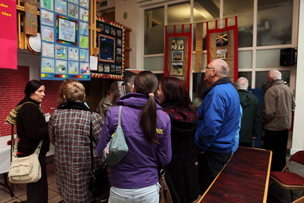 Islanders and guests at the launch of the exhibition: 'Rathlin Reflections - threads from an Island home Installation'. (Photo: Martin Melaugh)