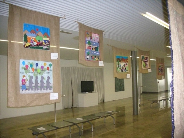 Arpilleras on display in the exhibition: 'The Politics of the Mundane in Chilean and other arpilleras' as part of Hanna's House Summer School 2010. (Photographer unknown)